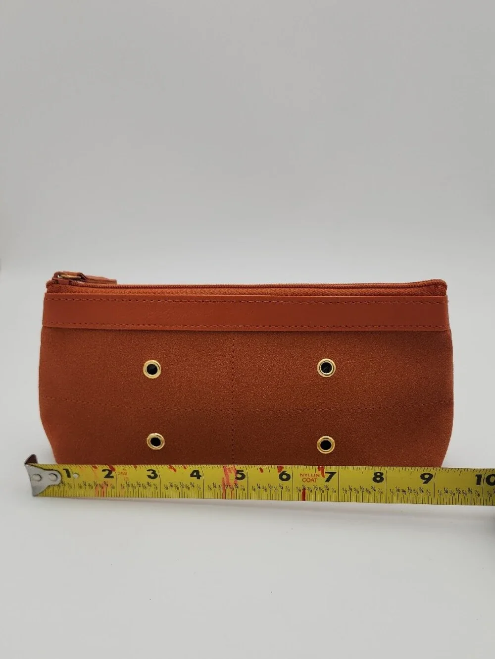 Estee Lauder Sleek Burnt Orange Zip Pouch with Gold Grommets